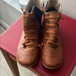 Brown Lace Up Boots with Unique Straps and Rounded Toe